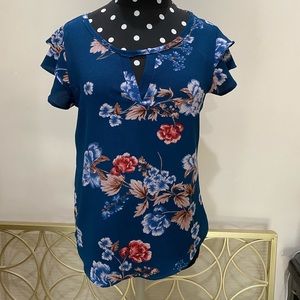 Floral shirt with ruffled sleeves